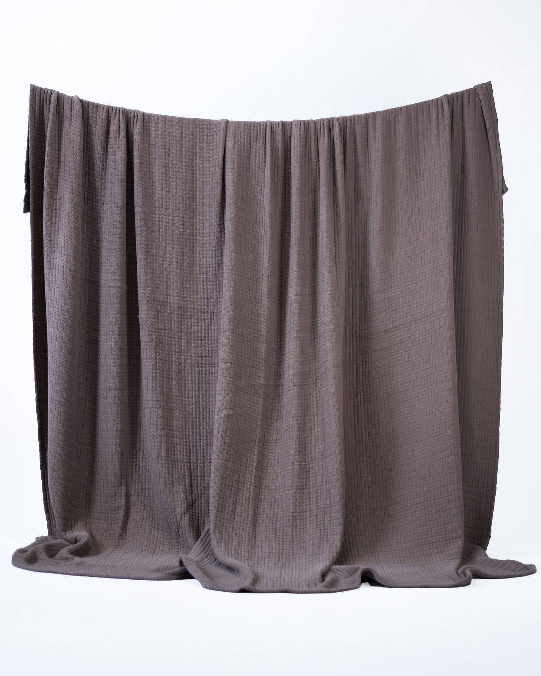 The Stitched Cotton Quilt in Chocolate