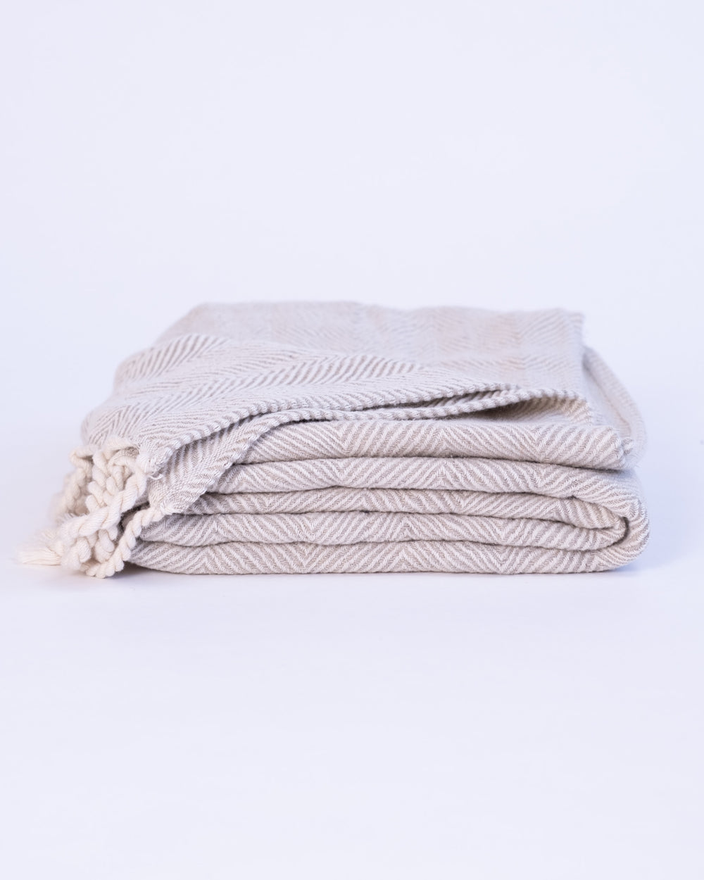 The Linen Herringbone Throw in Natural
