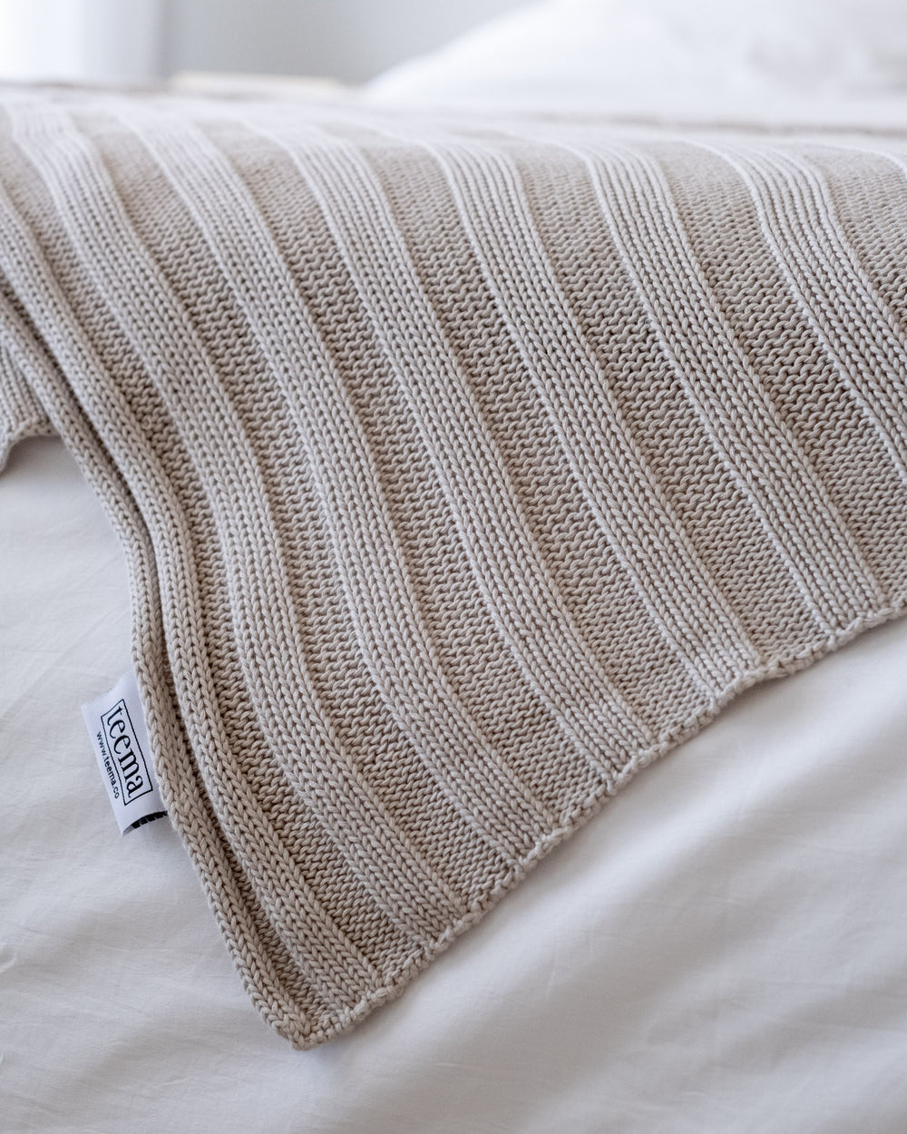 The Rib Knit Throw in Bone