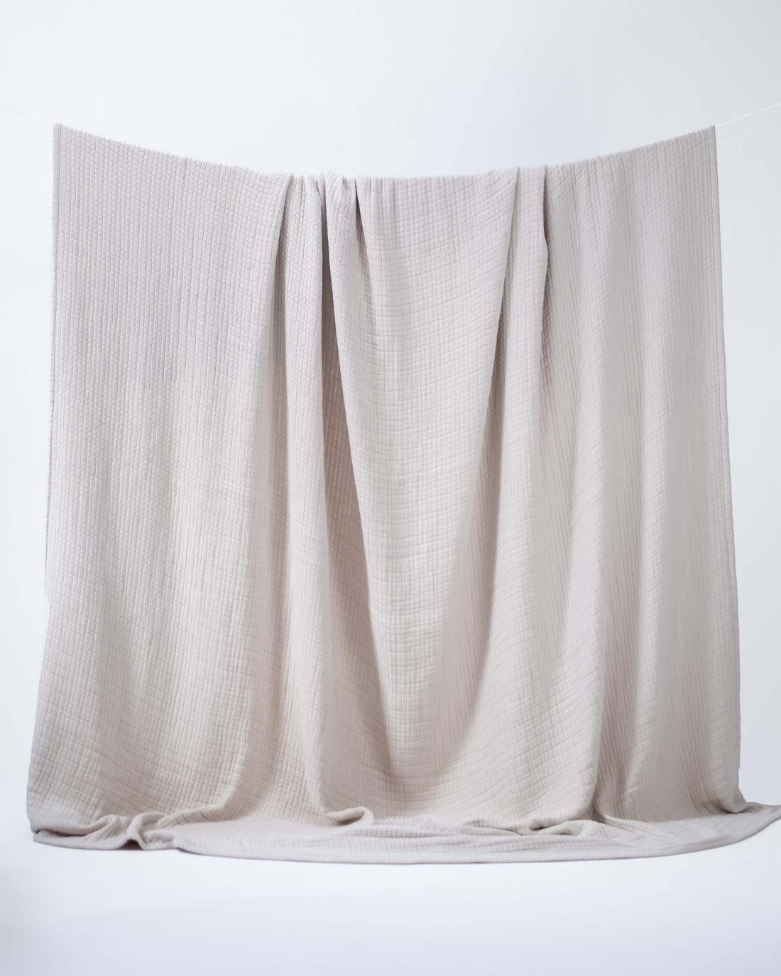 The Stitched Cotton Quilt in Bone